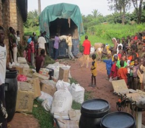 Large truck-load of supplies arrive to everyone's great delight.